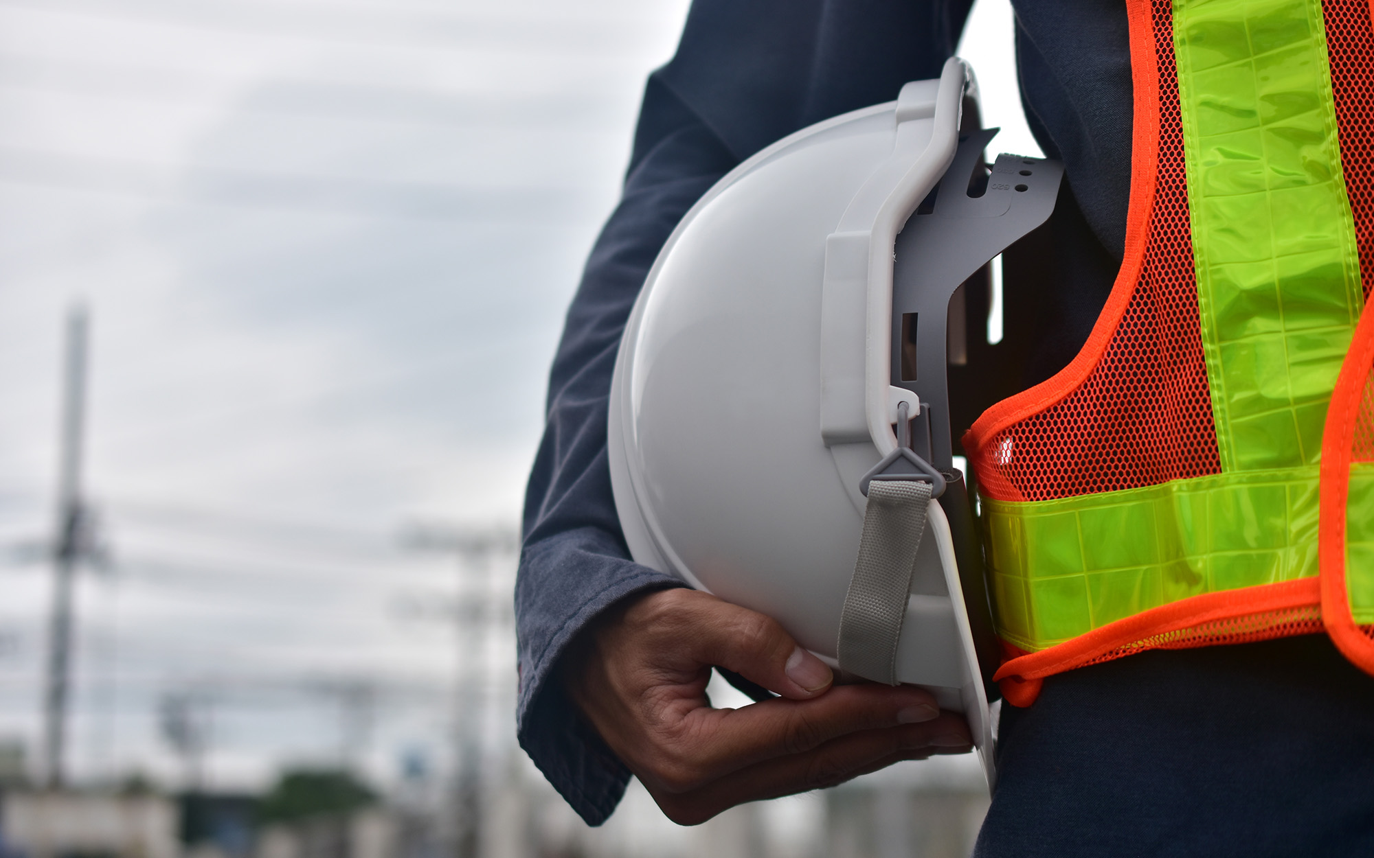 Engineer holding hard hat safety at work place and building development estate